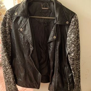 Black leather jacket with fabric sleeves